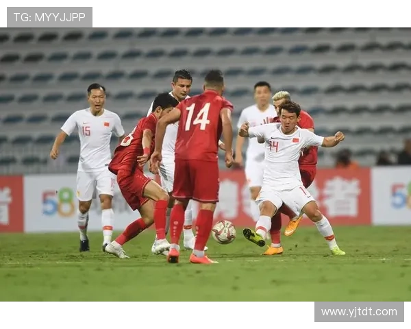 中国足球队迎战亚洲劲旅，力争突破世界杯预选赛小组赛难关